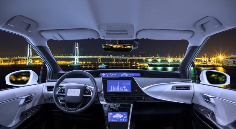 Interior view of a modern car with a high technology dashboard display